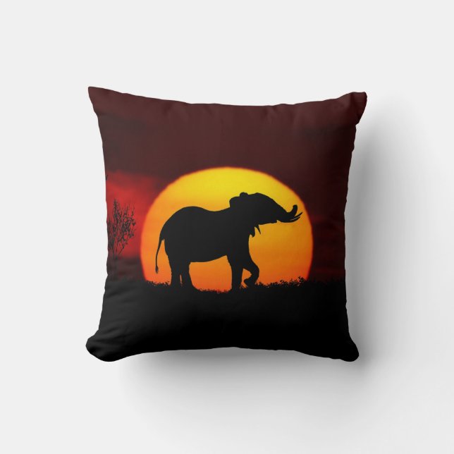 Wild elephant silhouette & sunrise on a jungle throw pillow (Front)