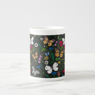 Wild flowers and butterflies on black bone china mug