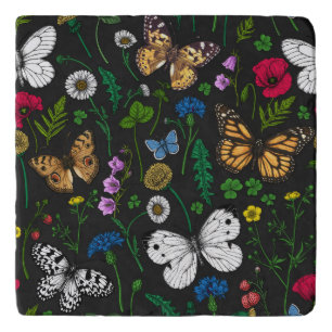 Wild flowers and butterflies on black trivet