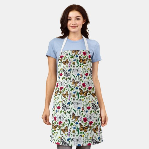 Wild flowers and butterflies on white apron