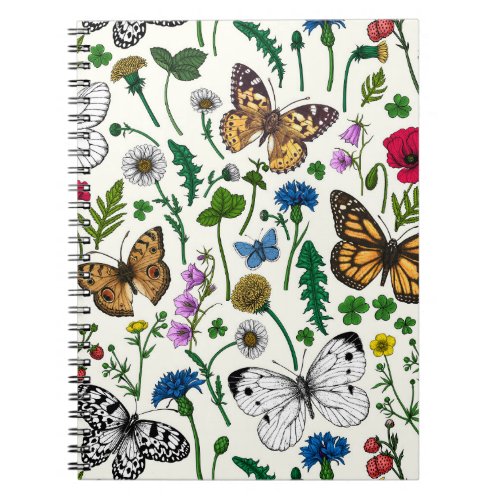 Wild flowers and butterflies on white notebook