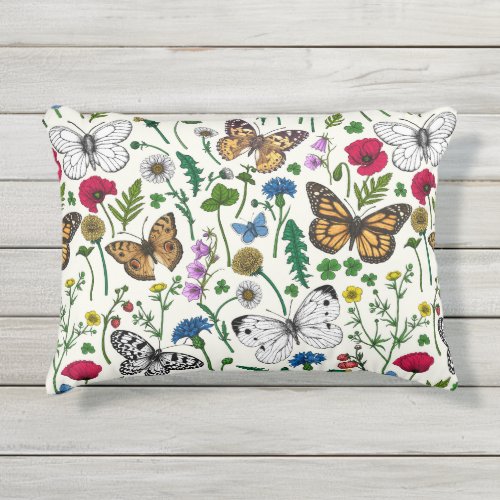 Wild flowers and butterflies on white outdoor pillow