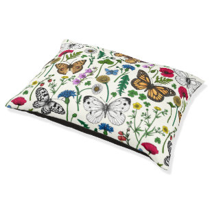 Wild flowers and butterflies on white pet bed