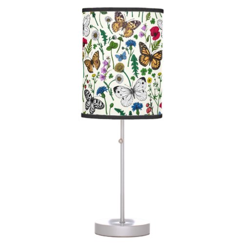 Wild flowers and butterflies on white table lamp
