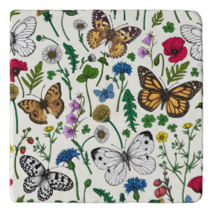 Wild flowers and butterflies on white trivet