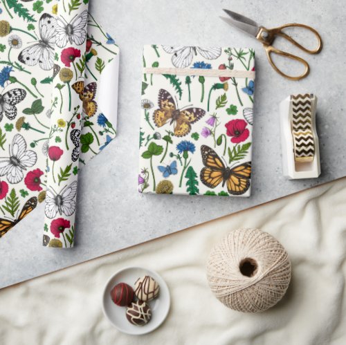 Wild flowers and butterflies on white wrapping paper