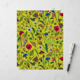 Wild flowers and moths on green