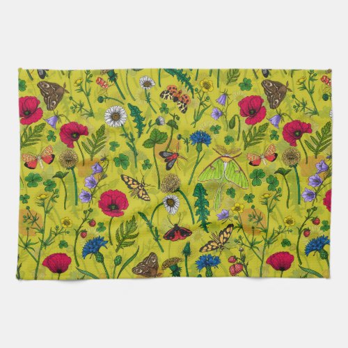 Wild flowers and moths on green kitchen towel