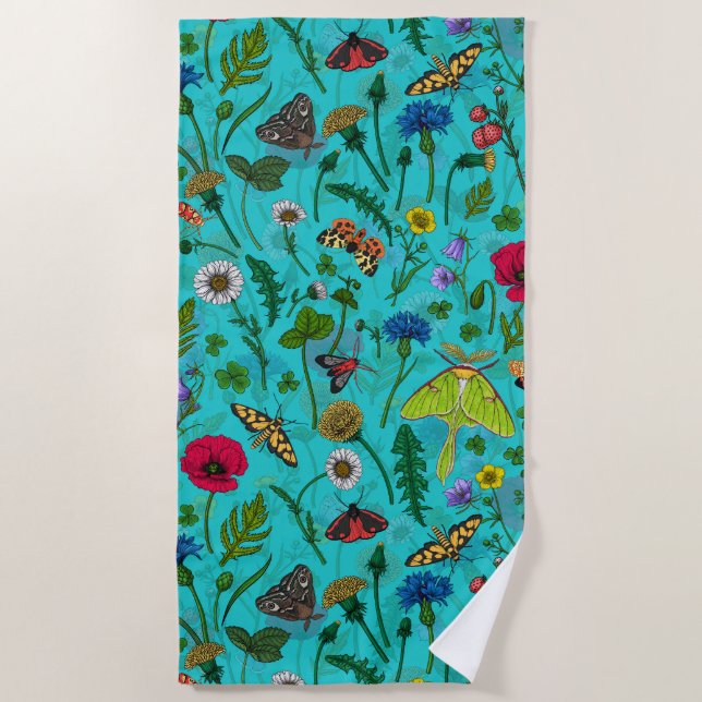 Wild flowers and moths on teal beach towel (Front)
