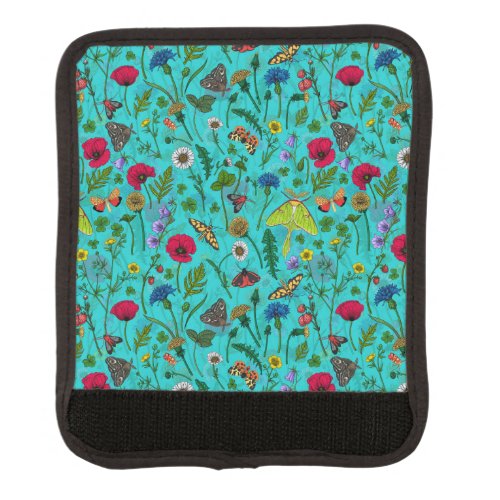 Wild flowers and moths on teal luggage handle wrap