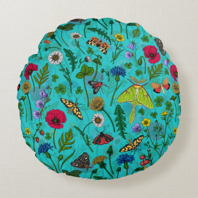 Wild flowers and moths on teal round pillow (Front)