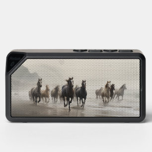 Wild horses on a foggy beach bluetooth speaker