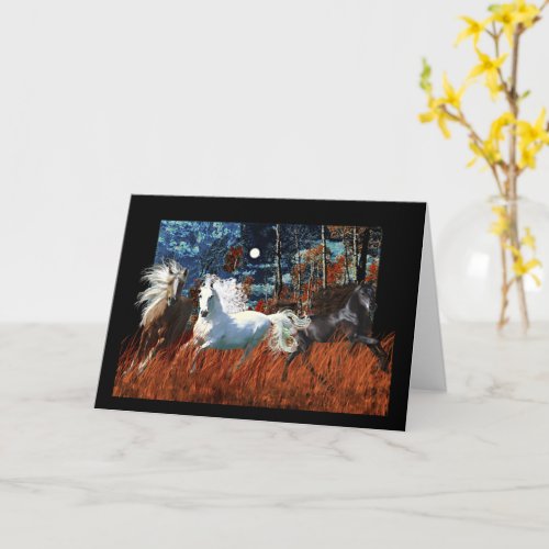Wild horses prancing in a twilight sky card
