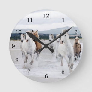 Wild Horses running on a beach clock