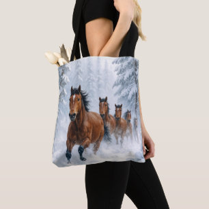 Wild Horses Running Through a Snowy Forest Tote Bag