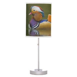 Wild Mandarin Duck Aix galericulata) on dark Table Lamp