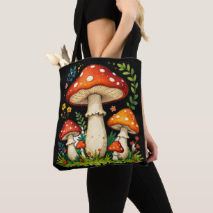 Wild mushrooms and flowers in grass forest nature tote bag