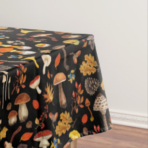 Wild mushrooms on black tablecloth