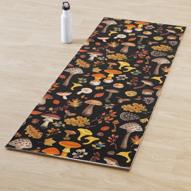 Wild mushrooms on black yoga mat (In Situ)