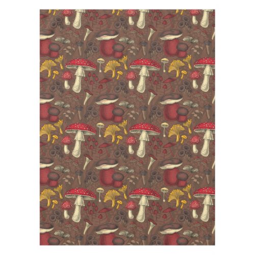Wild mushrooms on brown tablecloth