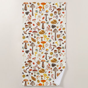 Wild mushrooms on off white beach towel
