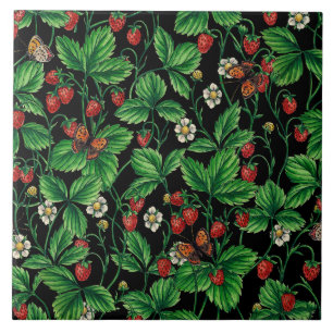Wild strawberries on black ceramic tile