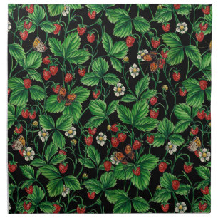 Wild strawberries on black cloth napkin