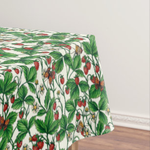 Wild strawberries on off white tablecloth