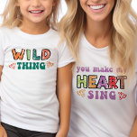 Wild Thing You Make my Heart Sing Groovy Matching T-Shirt<br><div class="desc">'wild thing' kids t-shirt with matching 'you make my heart sing' mom t-shirt version available. This colorful typography design features curvy modern retro lettering and sketched print in bright colors, decorated with love hearts. Funny quote, split across the mother and child outfit which also work fine individually. Perfect for mother's...</div>