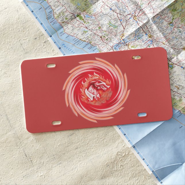 Wild Wolf Whirling red plastic car license plate (In Situ)