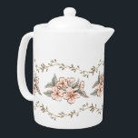 Wildflower Garden Tea Party Teapot<br><div class="desc">This beautiful teapot has a delicate leafy vine border on the top and bottom with pink wildflowers running through the center. Colors include sage green,  blush pink and brown.</div>