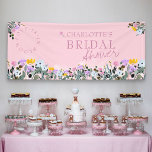 Wildflower Lawn Love is in Bloom Bridal Shower Banner<br><div class="desc">Wildflower Bridal Shower welcome banner, titled Love is in Bloom, with a floral border of wild flowers in pink lilac yellow and blue. The design sits on a pretty pink background with soft haze of white watercolor wash behind the lower border. If you would like matching products, please browse my...</div>