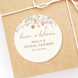 Wildflower Thank You Bridal Shower Love In Bloom Classic Round Sticker<br><div class="desc">Express gratitude with our Wildflower Thank You Bridal Shower In Bloom Classic Round Sticker. These charming stickers feature a delightful wildflower design, infusing a touch of natural beauty into your bridal shower thank-you notes or favors. The classic round shape adds versatility, making them perfect for various uses, from sealing envelopes...</div>