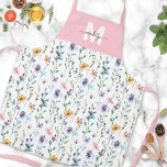 Wildflower Watercolor Pink Custom Name Apron<br><div class="desc">This personalized apron features a soft pink panel at the top with a white initial and dark gray name for an elegant, modern look. The bottom showcases a beautiful wildflower pattern in pink, purple, blue, green, and yellow, creating a fresh and cheerful springtime vibe. Ideal for Mother’s Day, birthdays, or...</div>