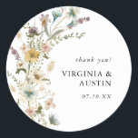Wildflower Wedding Classic Round Sticker<br><div class="desc">Wildflower Wedding Classic Round Sticker. This elegant whimsical wildflower wedding sticker features beautiful hand-painted watercolor blush pink,  dusty blue,  and sage green pressed flowers with black text on a white background. Find matching items in the Wildflower Wedding Invitations | Pressed Flowers Collection.</div>