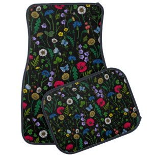 Wildflowers on black car floor mat