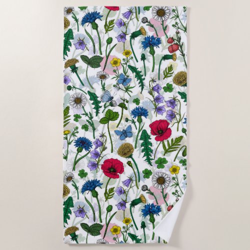 Wildflowers on off white beach towel