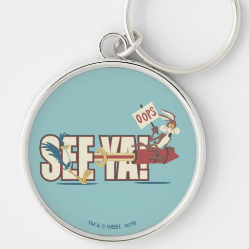 Wile E Coyote Rocketing Past ROAD RUNNERâ Keychain