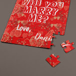 Will you marry me personalized marriage proposal jigsaw puzzle<br><div class="desc">Popping the question: "Will you. marry me?" Follow your heart and make a surprise keepsake cute proposal gift to your girlfriend to savor the memories of your beginnings all your life! Fully customizable message text on vibrant red with hearts Valentines pattern and your names. You can replace the text with...</div>