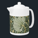William Morris Pimpernel Vintage Pattern Teapot<br><div class="desc">William Morris Pimpernel Floral Vintage Art Wallpaper Design William Morris was an English textile designer, artist, writer, and socialist associated with the Pre-Raphaelite Brotherhood and British Arts and Crafts Movement. He founded a design firm in partnership with the artist Edward Burne-Jones, and the poet and artist Dante Gabriel Rossetti. This...</div>