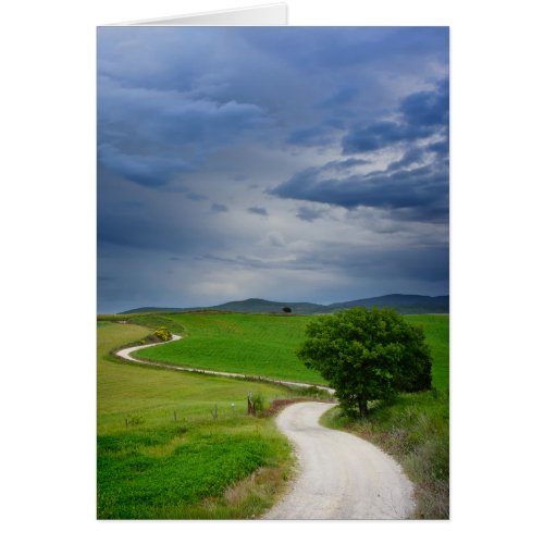 Winding road under a dark sky