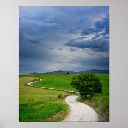 Winding road under a dark sky poster