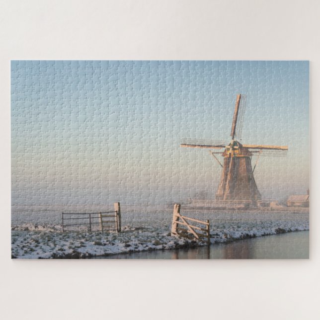 Windmill and a fence during a winter sunrise jigsaw puzzle (Horizontal)