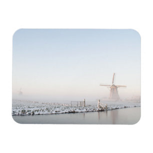 Windmill in the snow in winter rectangular magnet