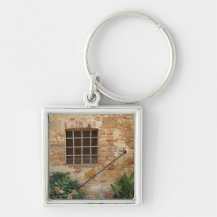 Window and ancient stone wall, Pienza, Italy Keychain