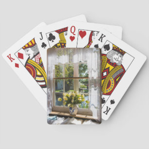 Window with lace curtain and tulips poker cards