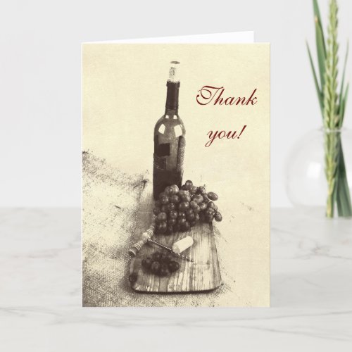 Wine bottle corks grapes and corkscrew on wood thank you card