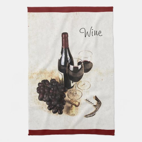 Wine bottle glasses grapes and corks towel