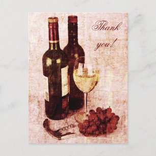 Wine bottles, wine glass and grapes postcard