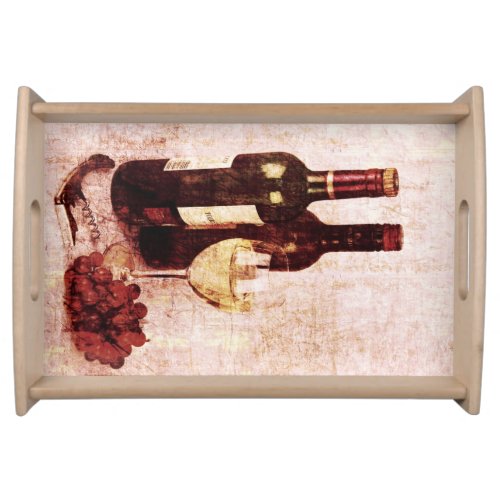 Wine bottles wine glass and grapes serving tray